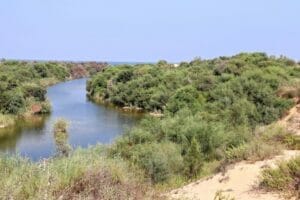 Soon you'll see the river to your left. Holot Zikim